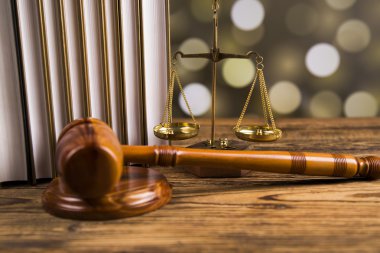 Golden scales of justice, books, Statue of Lady Justice. Owl and paragraph