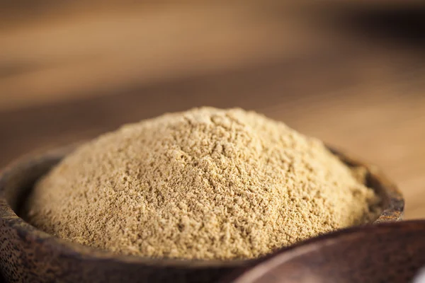 Spices and herbs in wooden bowls — Stock Photo, Image