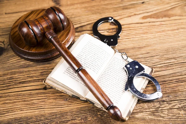 Golden scales of justice, books, Statue of Lady Justice. Owl and paragraph