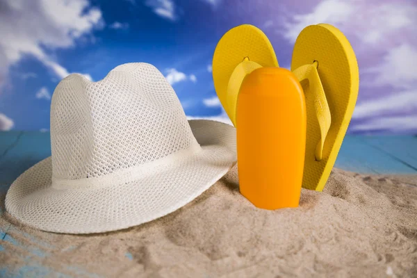 Vacation, sand, colorful molds for the sandbox, flip-flops colorful shells, the belt for swimming