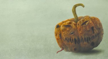 Balkabağı resimlerindeki korkunç yüz, Korkunç kutsal hayalet ve ürkütücü konsept, sürreal sanat, şeytan portresi, resim. 