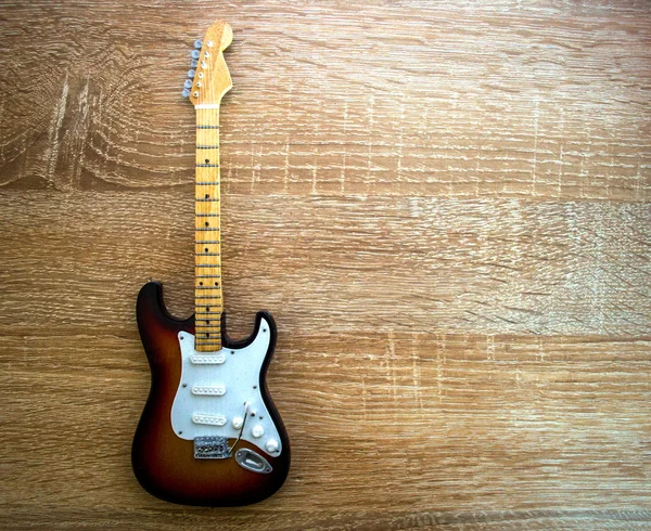 Mini brown guitar — Stock Photo, Image