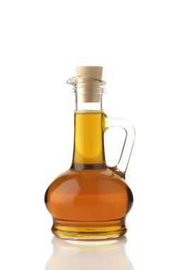 Beyaz zemin üzerine hardal yağı 