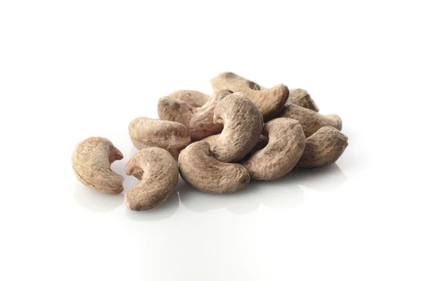 Heap Of Cashews With Skin on White Background Shot in Studio — Stock Photo, Image