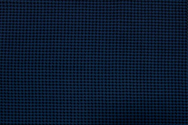 A close-up of the background made of blue-black wool textured fabric is suitable for autumn and winter wardrobe. Horizontal orientation — Stok fotoğraf