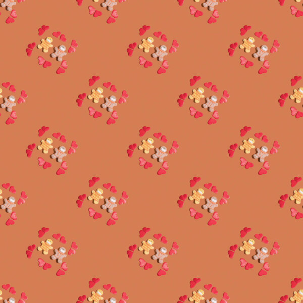 Бесшовная картина любящей пары разных рас в защитных масках во время пандемии коронавируса, окруженная сердцами.