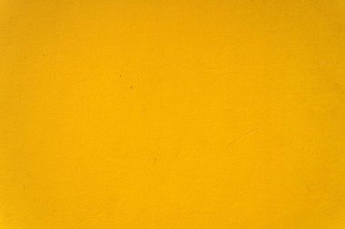 Soyut sarı çimento duvar dokusu ve arka plan. Modern duvar kâğıdı. Duvarın bazı grunge efektleri ve çizgileri vardır. Arkaplan ve doku kavramı.