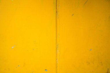 Soyut sarı çimento duvar dokusu ve arka plan. Modern duvar kâğıdı. Duvarın bazı grunge efektleri ve çizgileri vardır. Arkaplan ve doku kavramı.