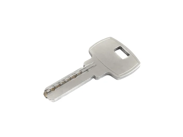 One blank grey key isolated on white background. Close-up. — Stock Photo, Image