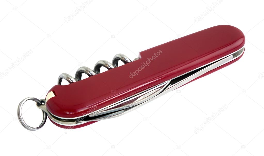 Closed swiss army red knife isolated on white background