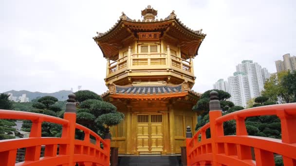 Red Wooden Arch Bridge and Golden Pavilion — Stock Video