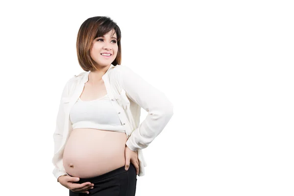 Красивая 9 месяцев беременная женщина счастлива — стоковое фото
