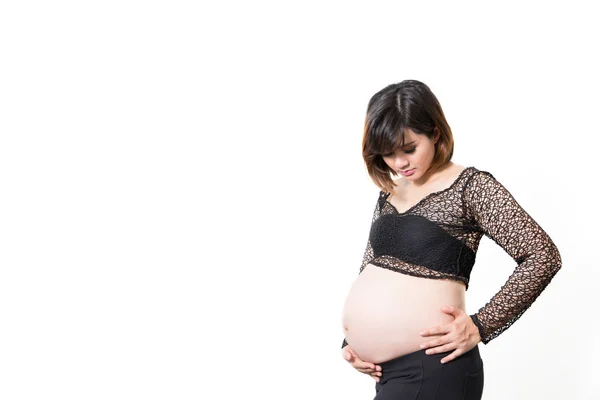 Беременная женщина выглядит животом 9 месяцев, предродовая — стоковое фото