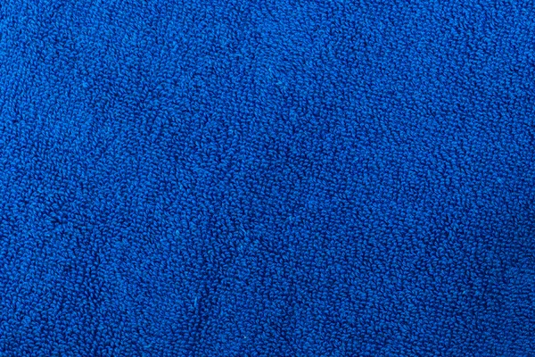 Una textura fina de suave toalla de baño de algodón azul — Foto de Stock