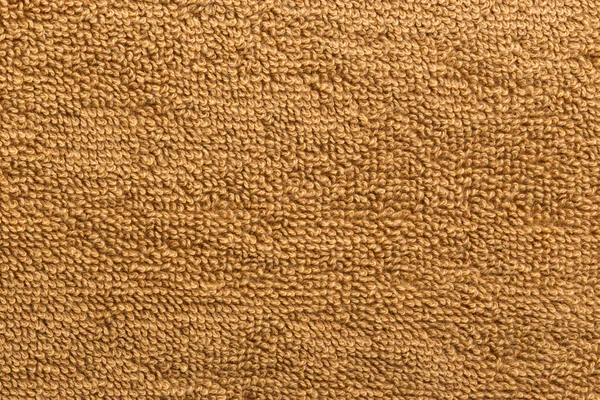 Una textura fina de suave toalla de baño de algodón naranja claro — Foto de Stock