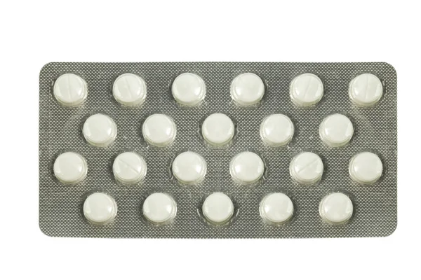 Medicinali in blister isolati su fondo bianco — Foto Stock