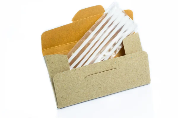 Cardboard paper box with cotton buds — Stock Photo, Image