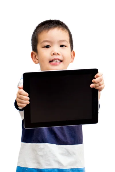 Küçük yakışıklı çocuk portre holding tablet gülümseyen yüzü