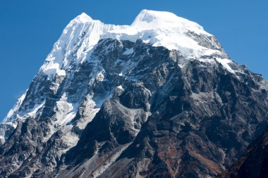 Summit of Mt. Langshisha Ri from Langtang Valley, Himalayas, Nepal clipart