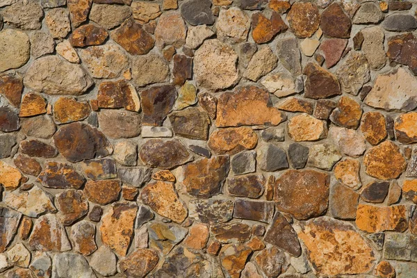 Textura colorida pared de piedra — Foto de Stock