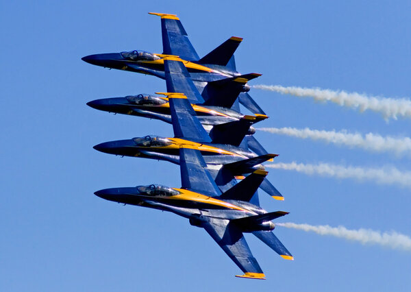 Planes in flight in blue sky