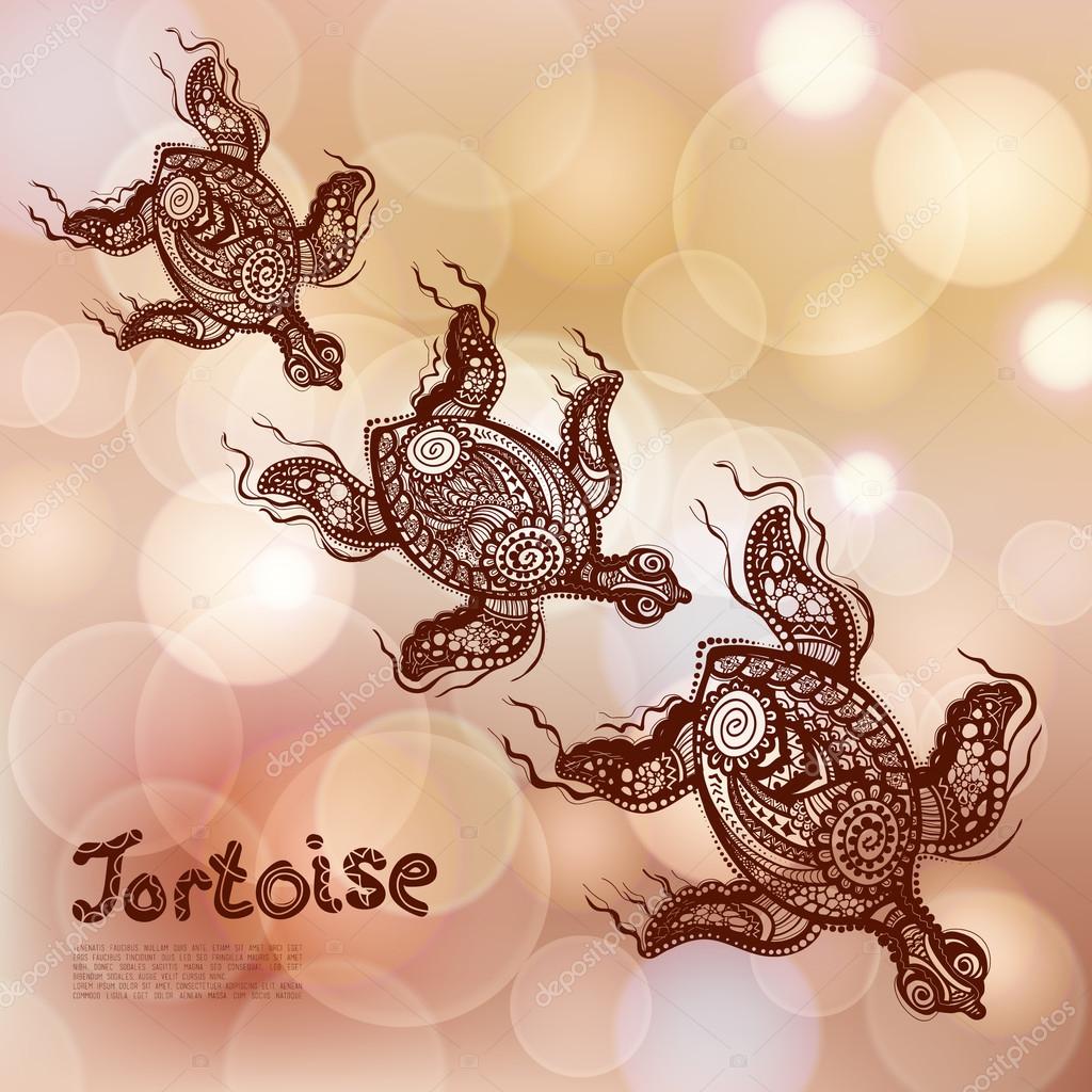 Turtles on the yellow bokeh background with ethnic patterns on them. Marine life