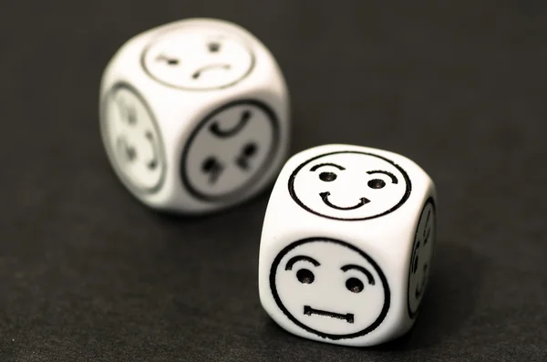 Dice with happy emoticon side — Stock Photo, Image