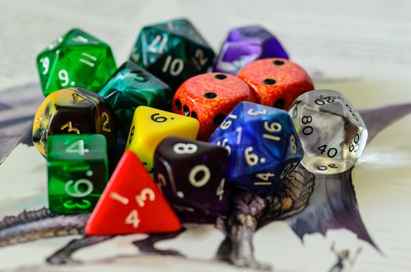 Role playing dices lying on picture background — Stock Photo, Image