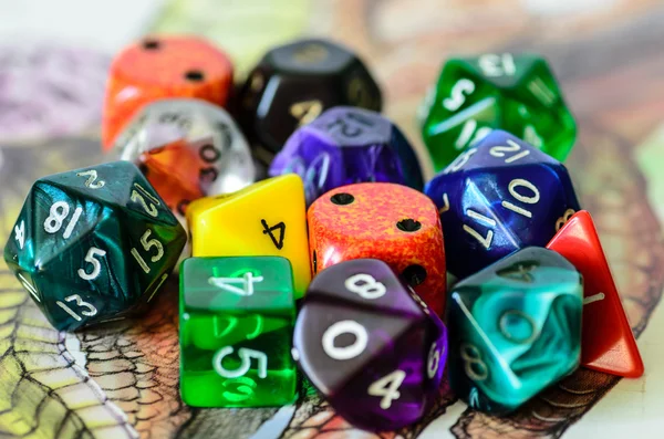 Role playing dices lying on picture background — Stock Photo, Image