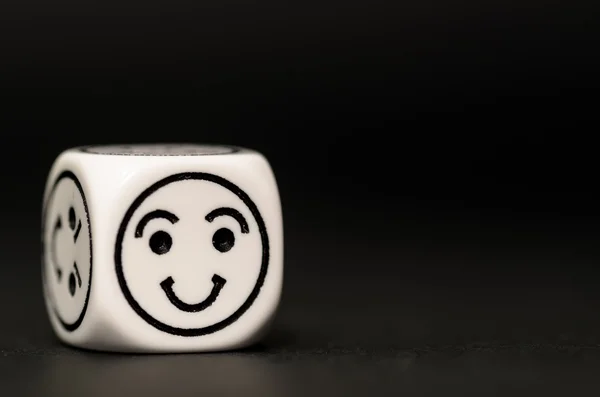 Single emoticon dice with happy expression sketch — Stock Photo, Image