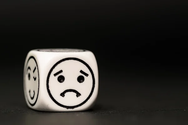 Single emoticon dice with sad expression sketch — Stock Photo, Image