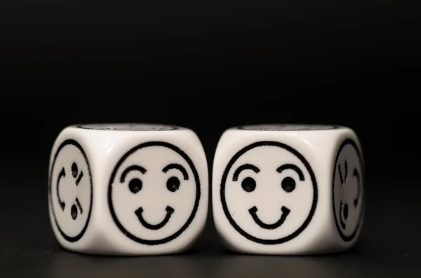 Two emoticon dice with happy expression sketch — Stock Photo, Image