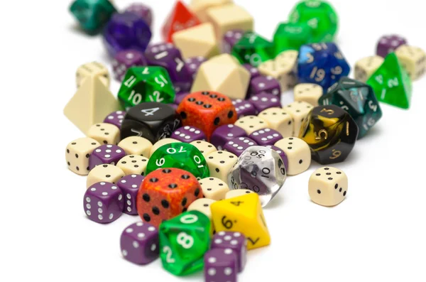 Multiple colorful role playing dices lying on isolated background — Stock Photo, Image