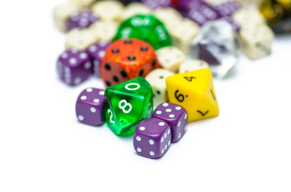 Multiple colorful role playing dices lying on isolated background — Stock Photo, Image