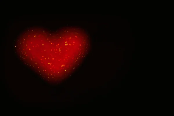 Black Isolated Background Red Blurred Heart Bokeh Greeting Card Texture — Stock Photo, Image