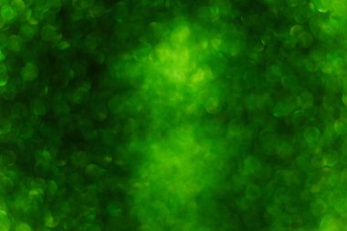 Bulanık odaklı arka plan. Yeşil siyah bokeh deseni. Aziz Patrick 'in Noel tebrik kartları için bir şablon. Soyut şablon. Dekorasyon için alan düzenini kopyala