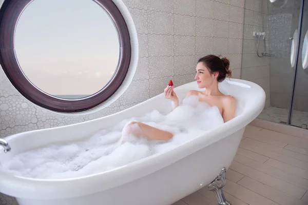 Young Woman Smilling White Modern Bath Foam Eats Juicy Strawberry — Stock Photo, Image