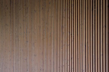 Dikey getirilmiş tahta tahta duvarlar. Soyut modern yüzey