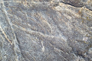 Gri ve siyah taş dokusu, granit yüzey, doğal taş duvar arka planı..