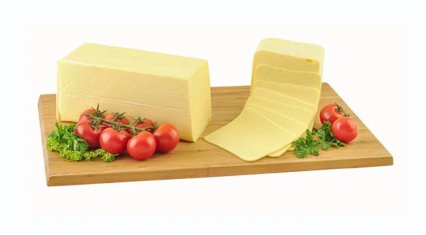 Block of cheese on wooden board. Clipping path.