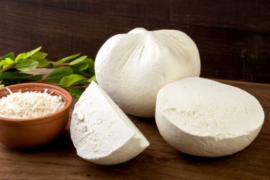 Traditional hard/dry white cheese called mizithra. Fresh cheese made with milk and whey from sheep and/or goats milk. clipart
