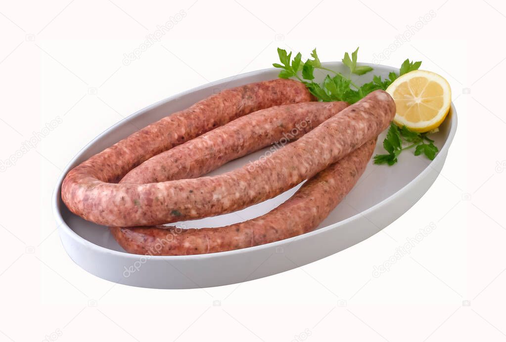 Traditional  sausages in white plate.Clipping path.