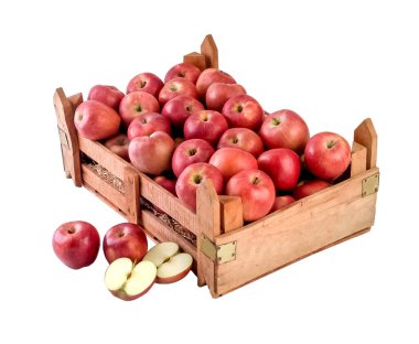 Elmalar ahşap sandığa. Kesme yolu