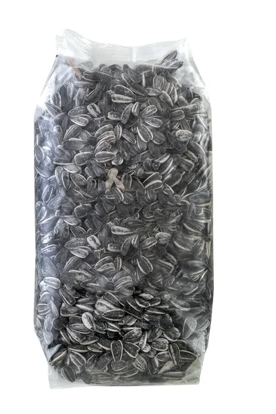 Ayçiçekli plastik torba tuzlu tohumlar, kırpma yolu.