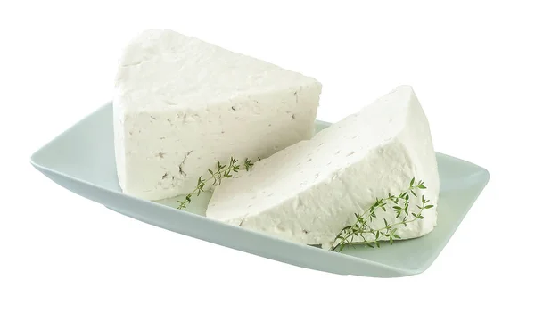 Koyun ve keçi sütünden yapılmış geleneksel Yunan peyniri fıçının yuvarlaklığı nedeniyle üçgen parçalara bölünmüştür. Bu gerçek Yunan geleneksel Feta peyniri..