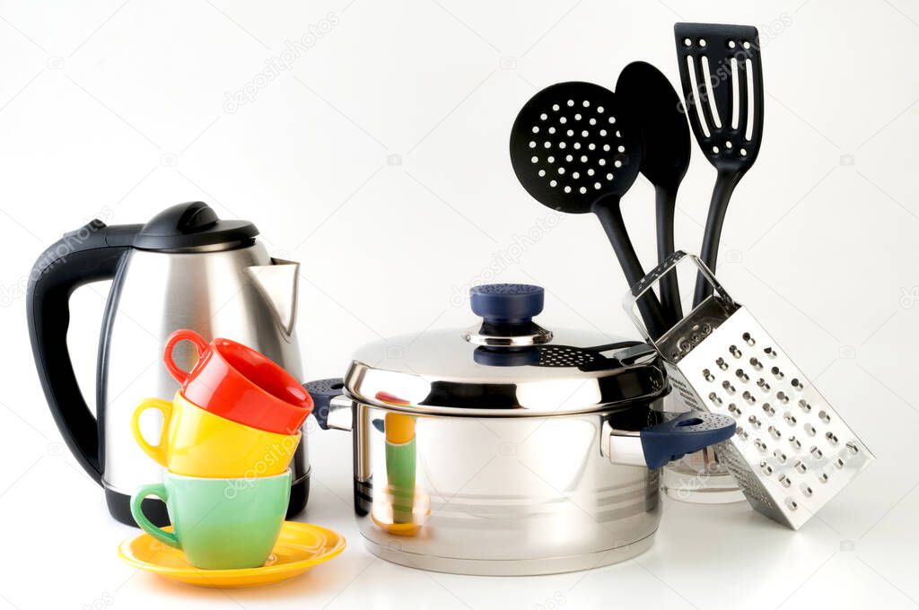Group of kitchen utensils and electric appliances.