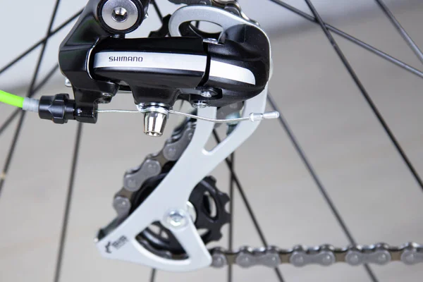 Close-up of bicycle gears and mountain bike chains. Reverse gear shifting