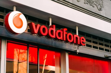 Barcelona, Spain - February 16, 2021. Vodafone is a multinational mobile phone, fixed line, broadband and digital television operator headquartered in Newbury, Berkshire, United Kingdom clipart