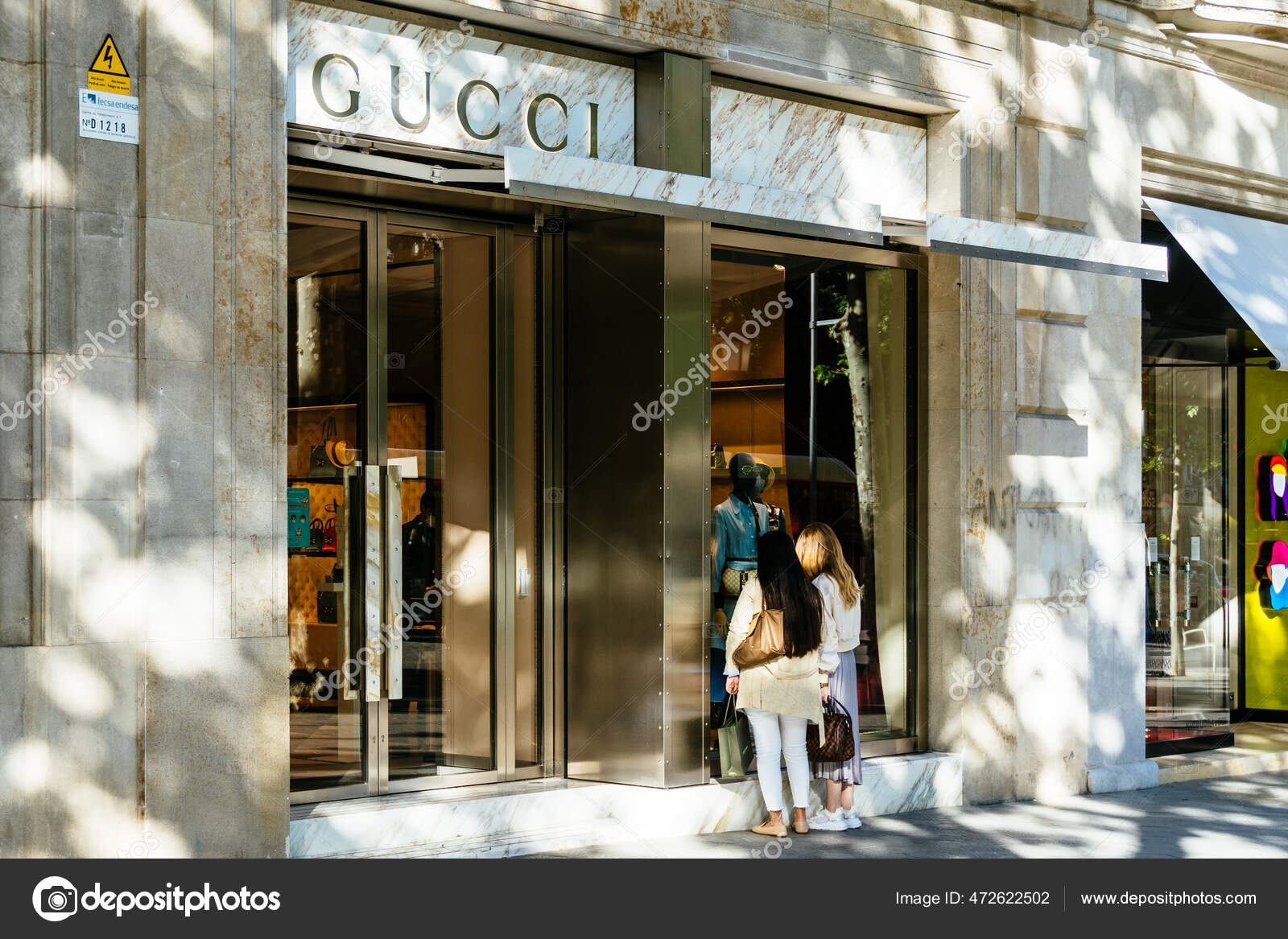 Window shopping gucci Window shopping gucci Stock & Images Depositphotos®