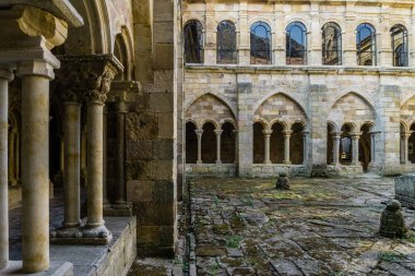 Palencia, Spain - August 21, 2021. Cloister of the Santa Maria la Real monastery, Aguilar de Campoo, Palencia, Spain clipart